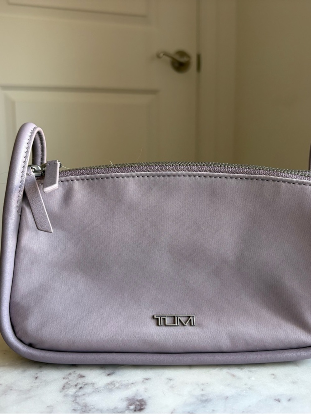 TUMI Lavender Women’s Zip Pouch Bag